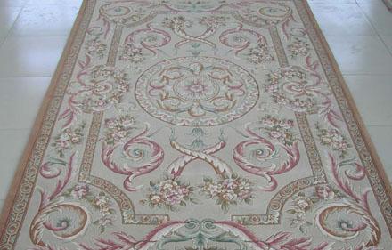 慎選手工地毯國內(nèi)低價產(chǎn)品值得留意